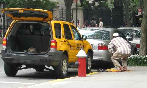 Muslim Cab Driver Praying on NYC Sidewalk
